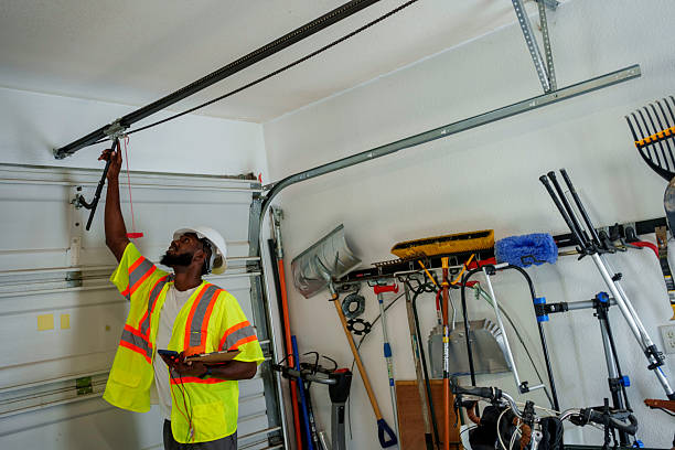 Professional Garage Door Roller Replacement technician working in Millbourne, PA
